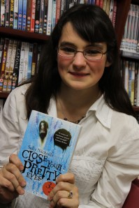 Sally with her new book - a chilling story about a girl carted from foster home to foster home who is being haunted by a ghost...or is she?