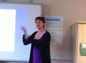 I tell one of my earliest stories: 'Chismas', written at the age of 5. Not sure why I'm doing a dinosaur impression.