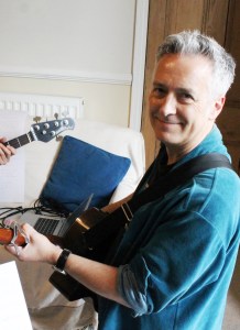 John Dougherty on acoustic guitar