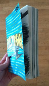 You can see where the comic strip sections are from the black edges of the pages