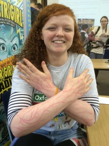 OUP staff member Caroline had Electrigirled her arms with lip liner in the lightning pattern Holly has in the book!