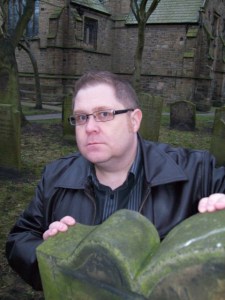 Celebrated writer Tommy Donbavand, hiding behind gravestones when he's not defacing windows